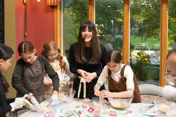 Giti baking with group at party