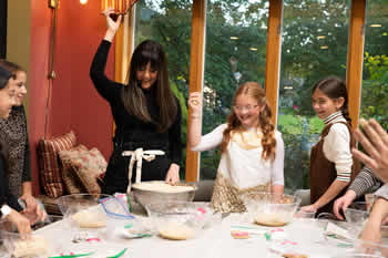 Giti teaching at a party